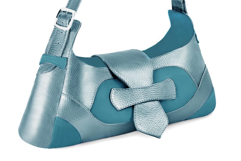 Handcrafted women's luxurious elegant handbag in premium peacock blue leather. Perfect for elevated everyday style.   
                Choose from our luxurious collections of leather and fabric to perfectly match your handbags to your outfits.